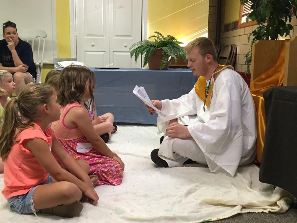 Children listening to a Bible story during a kids program